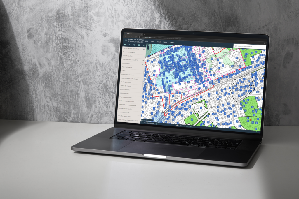 XMAP running on a laptop on a grey desk